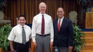 Mike with Orlando González on his left and Rev. Danny Cortes on his right